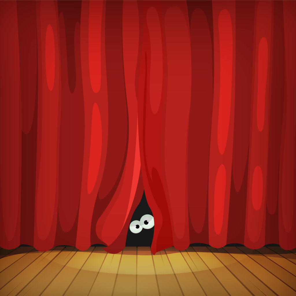 Eyes Behind Red Curtains On Wood Stage